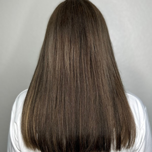 Brunette with a polished, straight finish